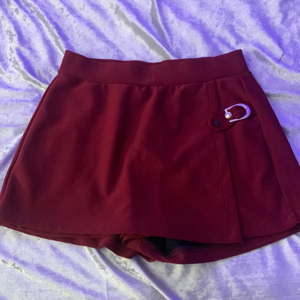 red belted shorts with skirt flap front size medium